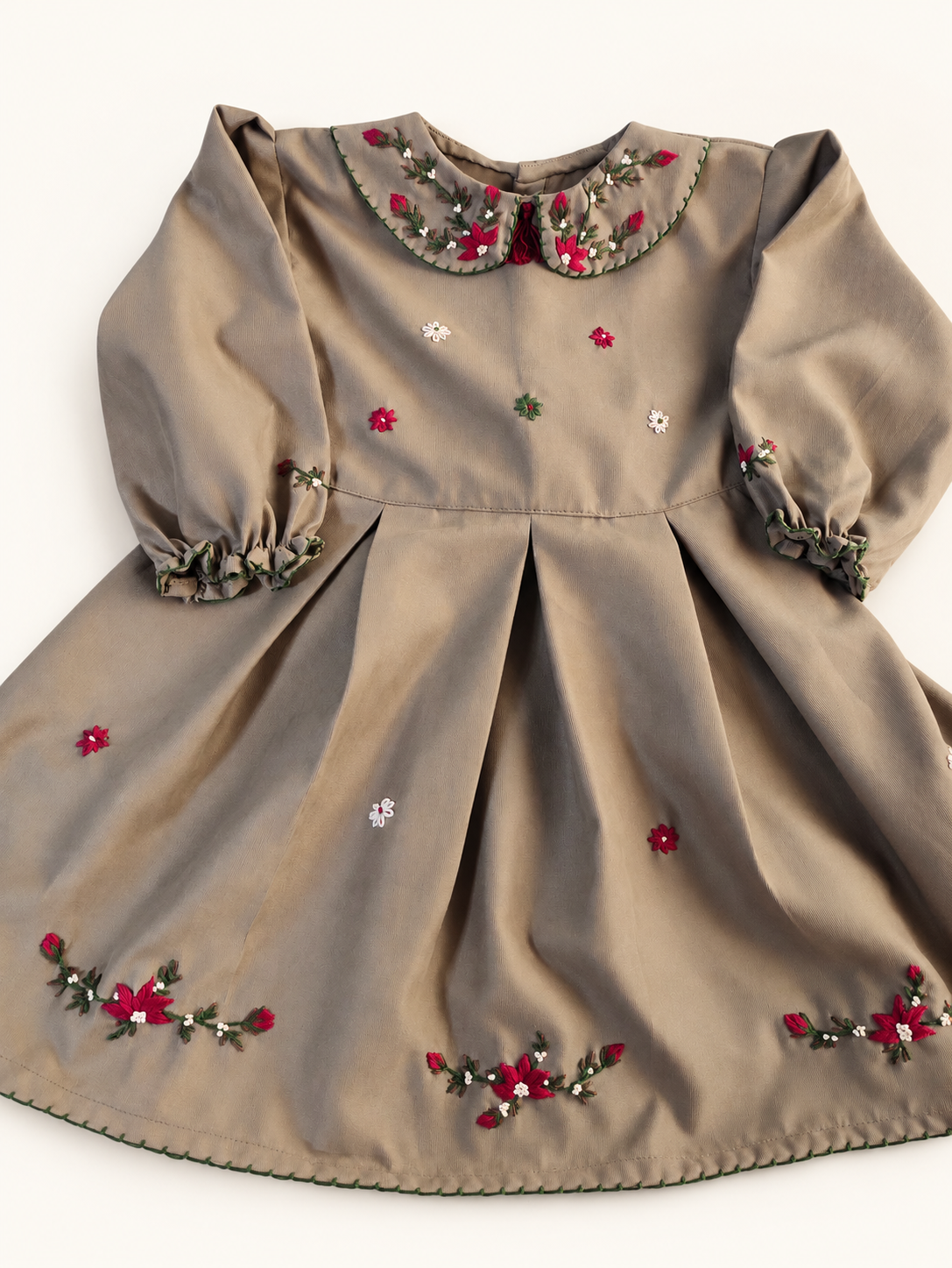 Taupe embroidered girls dress with long sleeves and floral skirt details