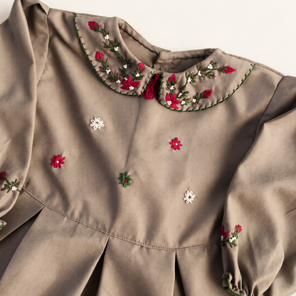 Red and ivory floral hand embroidery on the taupe Peter Pan collar