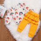 Rainbow Romper With Ruffled Pants, 6M to 24M.
