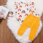 Rainbow Romper With Ruffled Pants, 6M to 24M.