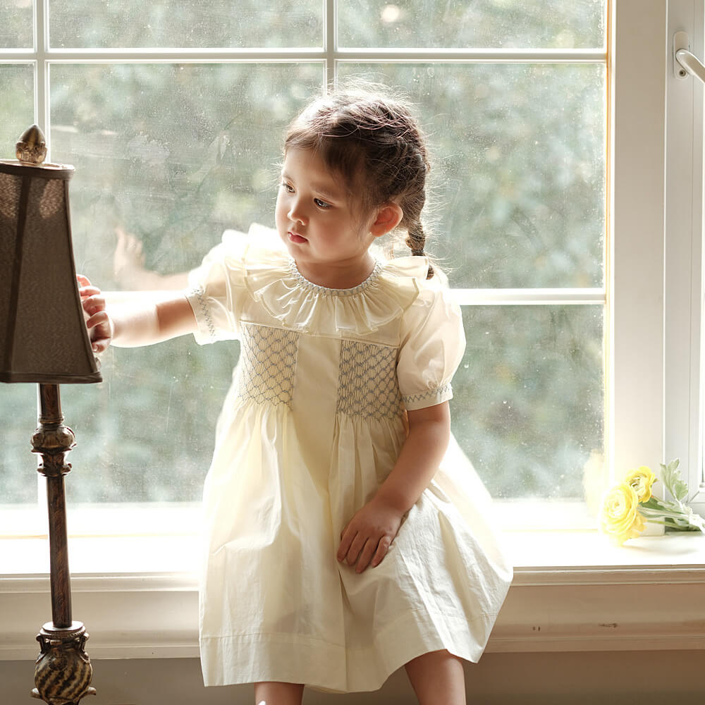 Stunning Off-White Hand Smocked Dress,2T to 7T.