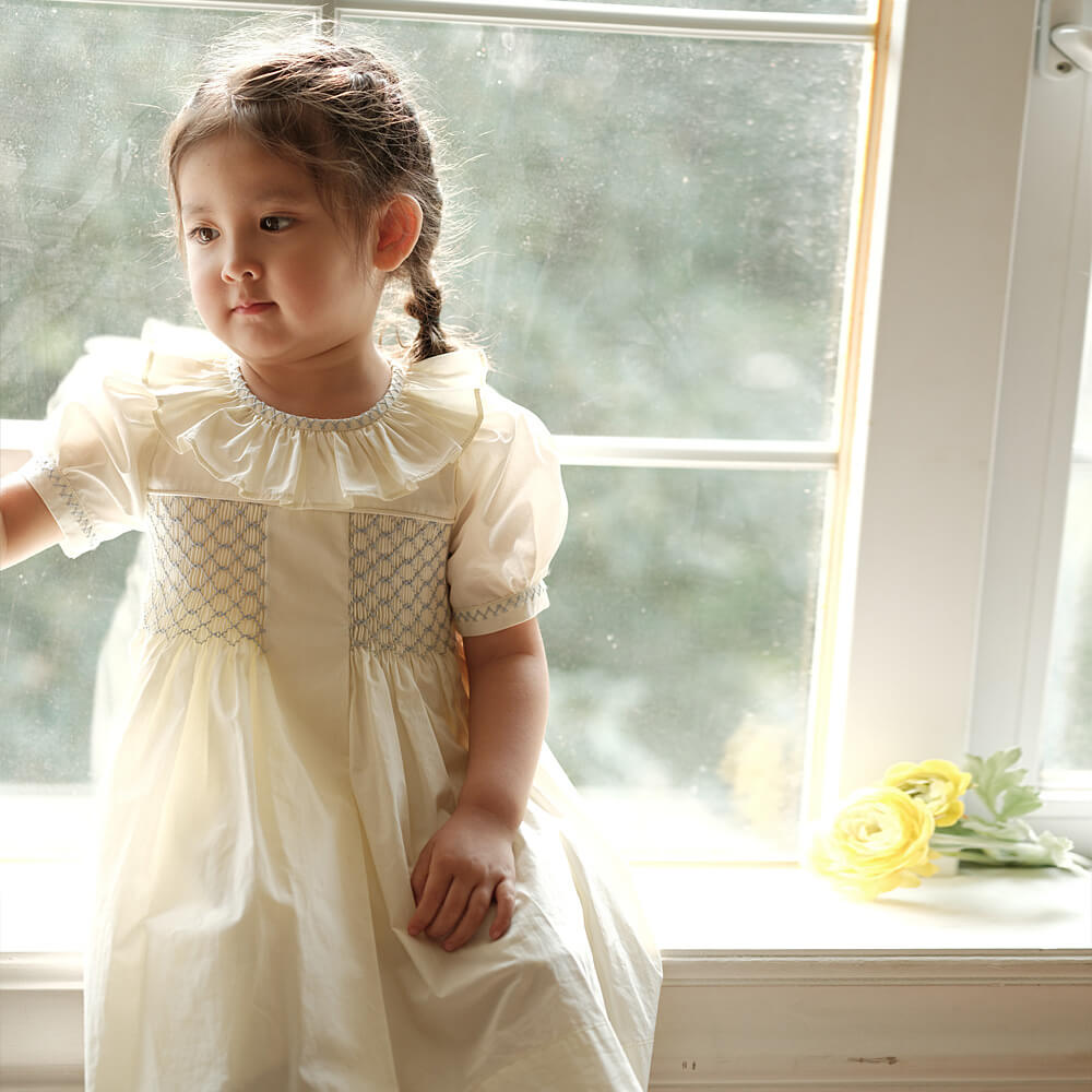 Stunning Off-White Hand Smocked Dress,2T to 7T.