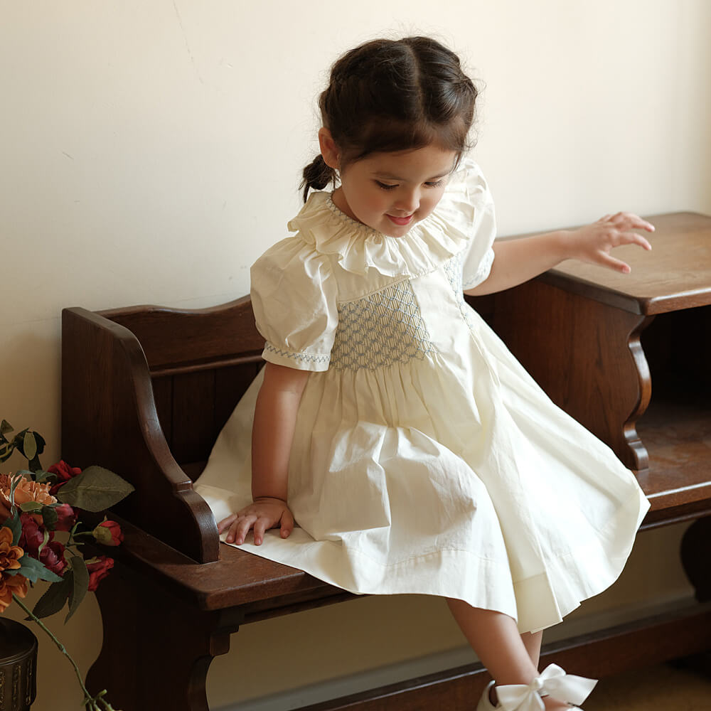 Stunning Off-White Hand Smocked Dress,2T to 7T.